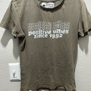 Dutch Bros Olive Green Graphic Tee with Pink Lining